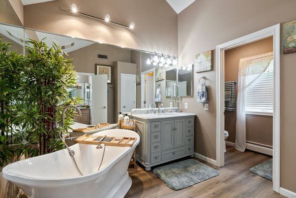 Bathroom, Dual Sink Vanities, Free Standing Baths, Interior, Recessed Lighting, Wood Texture Flooring