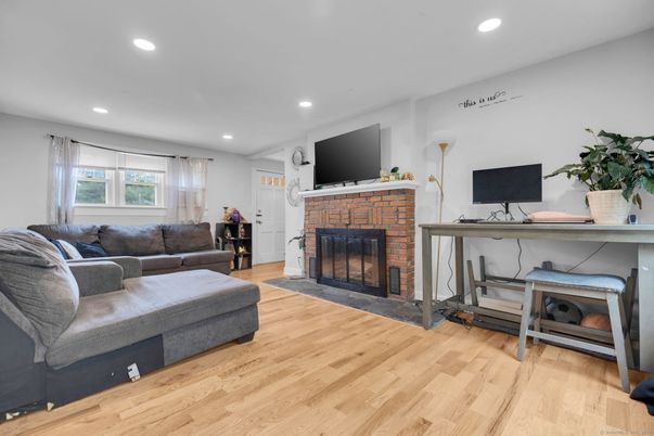 Fireplace, Interior, Living room, Recessed Lighting, Wood Texture Flooring