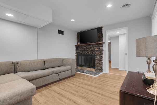 Fireplace, Interior, Living room, Recessed Lighting, Wood Texture Flooring