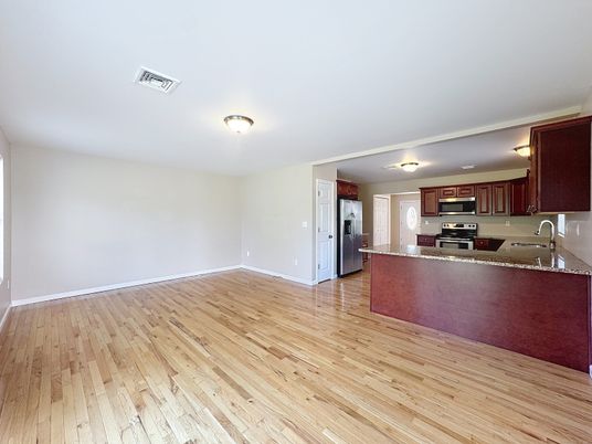 Empty room, Interior, Kitchen, Stainless Steel Appliances, Wood Texture Flooring