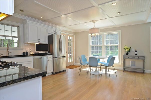 Dining room, Interior, Kitchen, Pendant Lights, Recessed Lighting, Stainless Steel Appliances, Wood Texture Flooring