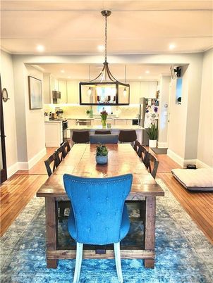 Dining room, Interior, Kitchen, Pendant Lights, Recessed Lighting, Stainless Steel Appliances, Wood Texture Flooring
