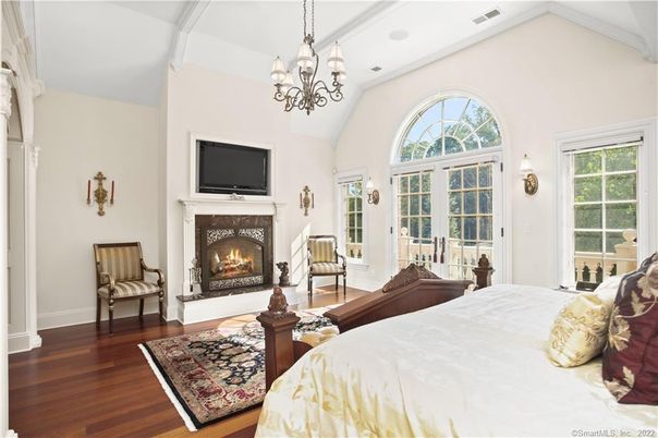 Bedroom, Chandelier, Fireplace, Interior, Wood Texture Flooring