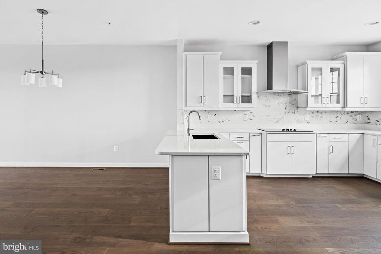 Interior, Kitchen, Marble Walls, Pendant Lights, Recessed Lighting, Wood Texture Flooring