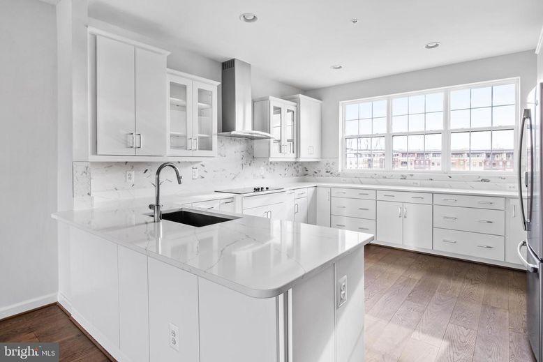 Interior, Kitchen, Marble Walls, Recessed Lighting, Wood Texture Flooring