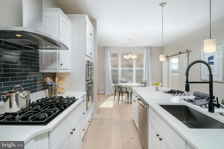 Chandelier, Dining room, Interior, Kitchen, Pendant Lights, Stainless Steel Appliances, Wood Texture Flooring