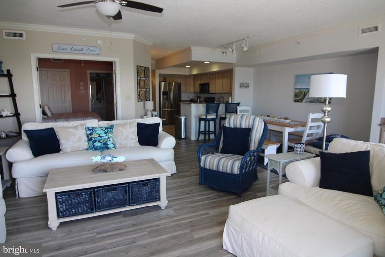 Dining room, Interior, Kitchen, Living room, Recessed Lighting, Stainless Steel Appliances, Wood Texture Flooring