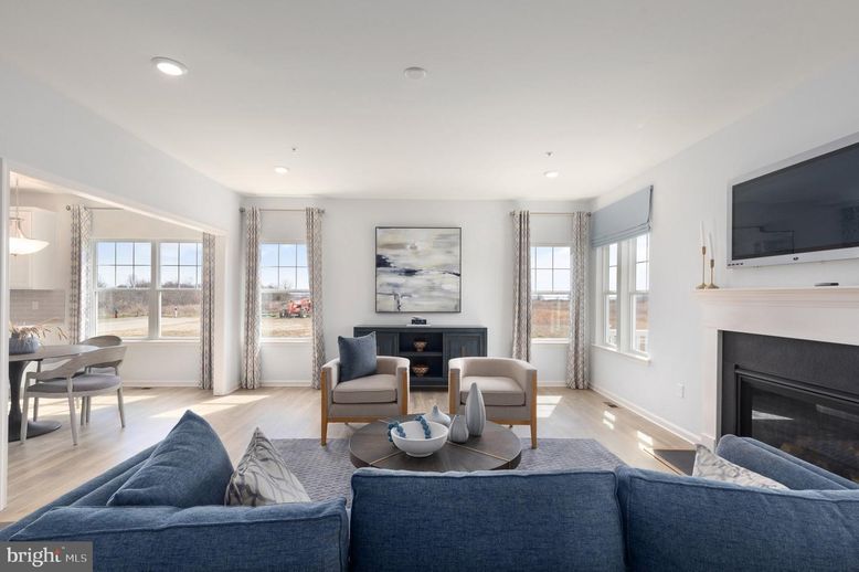 Dining room, Fireplace, Interior, Living room, Recessed Lighting, Wood Texture Flooring