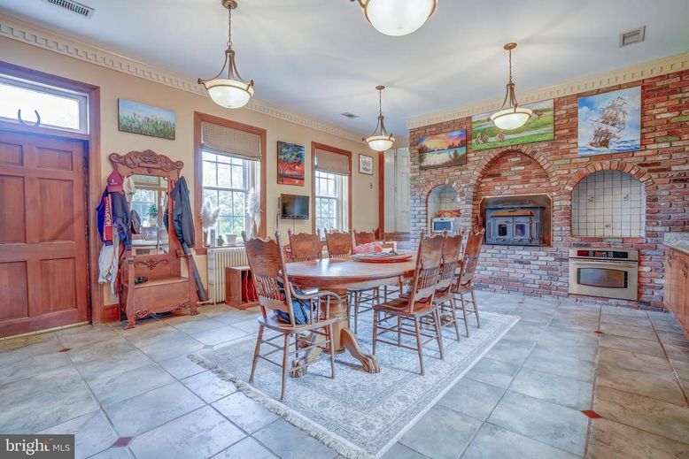 Dining room, Fireplace, Interior, Pendant Lights, Stone Walls