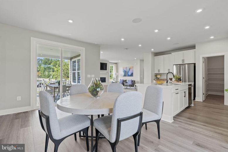 Dining room, Interior, Kitchen, Recessed Lighting, Stainless Steel Appliances, Wood Texture Flooring