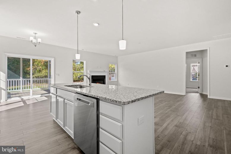 Chandelier, Fireplace, Interior, Kitchen, Pendant Lights, Recessed Lighting, Wood Texture Flooring