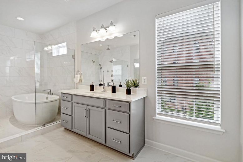 Bathroom, Dual Sink Vanities, Free Standing Baths, Glass Shower, Interior, Marble, Marble Walls, Recessed Lighting
