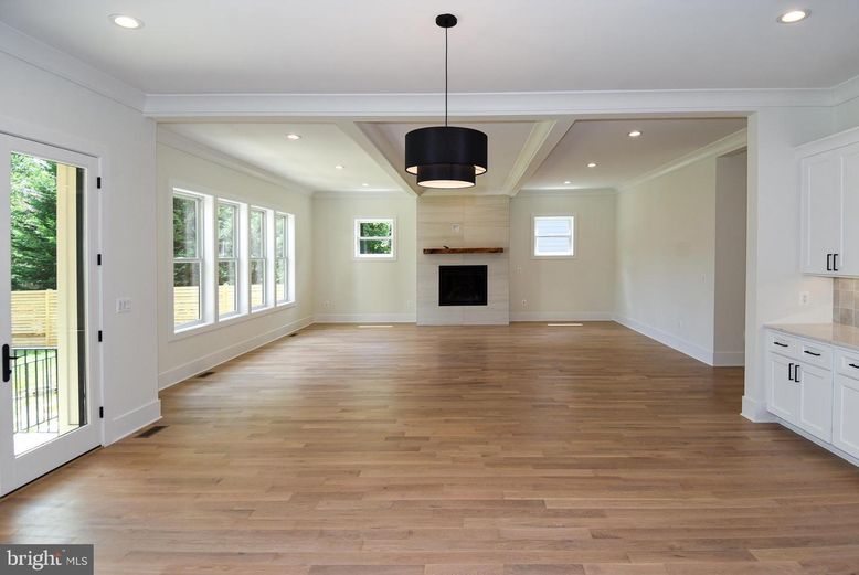 Empty room, Fireplace, Interior, Pendant Lights, Recessed Lighting, Wood Texture Flooring