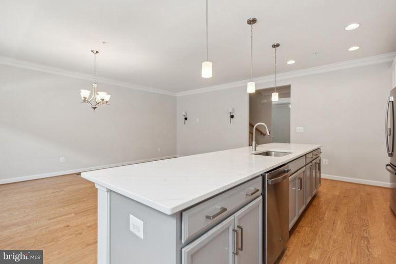 Chandelier, Interior, Kitchen, Pendant Lights, Recessed Lighting, Stainless Steel Appliances, Wood Texture Flooring