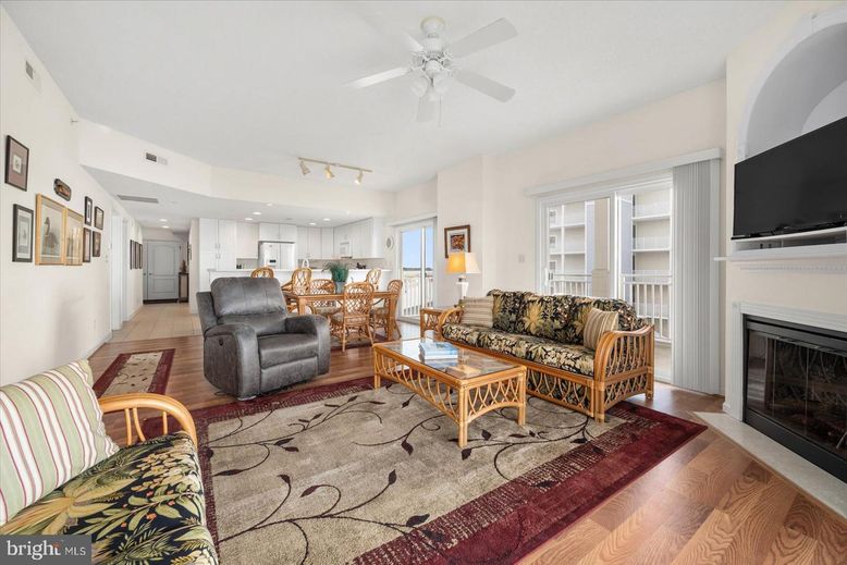 Dining room, Fireplace, Interior, Kitchen, Living room, Recessed Lighting, Wood Texture Flooring