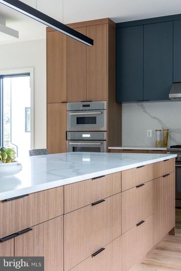 Interior, Kitchen, Marble Walls, Stainless Steel Appliances, Wood Texture Flooring