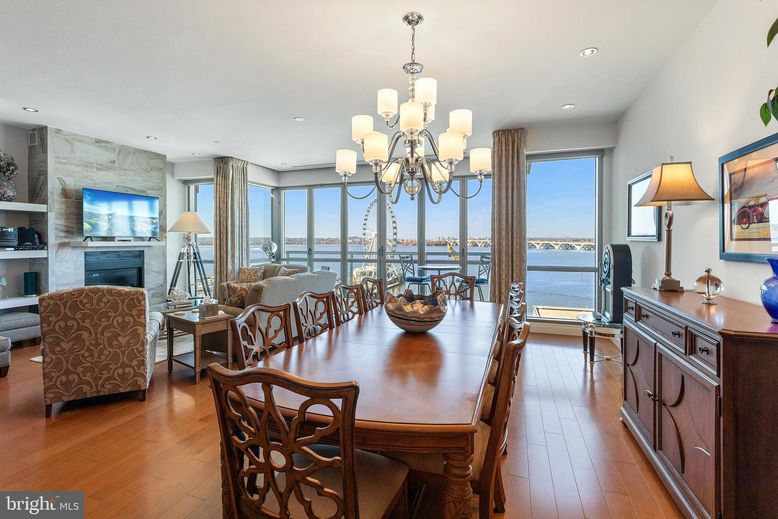 Chandelier, Dining room, Fireplace, Interior, Living room, Recessed Lighting, Water, Wood Texture Flooring