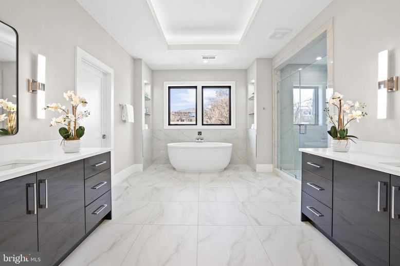 Bathroom, Dual Sink Vanities, Free Standing Baths, Glass Shower, Interior, Marble, Marble Walls, Recessed Lighting