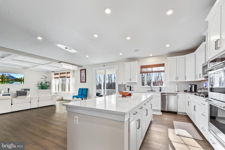 Chandelier, Interior, Kitchen, Pendant Lights, Recessed Lighting, Stainless Steel Appliances, Wood Texture Flooring