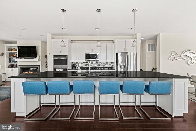 Fireplace, Interior, Kitchen, Pendant Lights, Recessed Lighting, Stainless Steel Appliances, Wood Texture Flooring