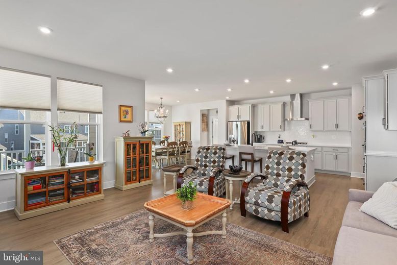 Chandelier, Dining room, Interior, Kitchen, Living room, Recessed Lighting, Stainless Steel Appliances, Wood Texture Flooring