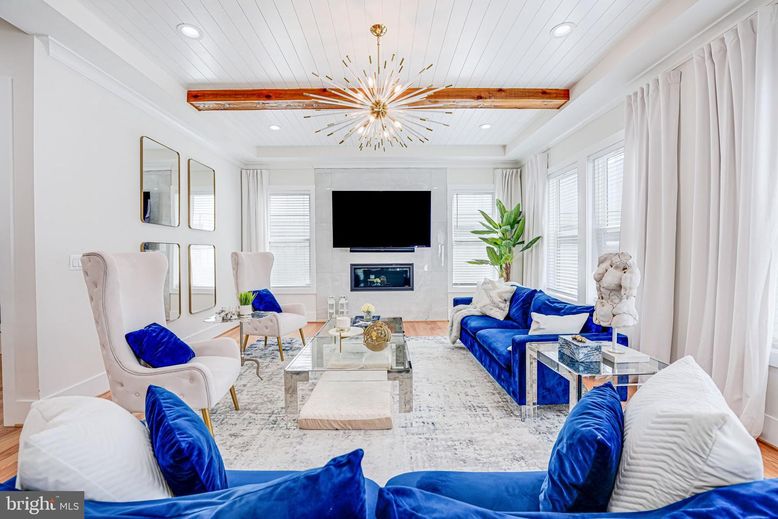 Fireplace, Interior, Living room, Pendant Lights, Recessed Lighting, Wooden Beams, Wood Texture Flooring