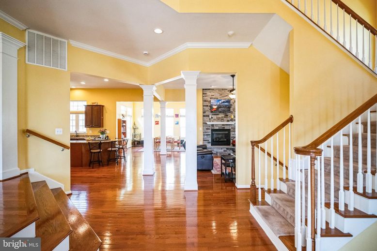 Fireplace, Interior, Kitchen, Pendant Lights, Recessed Lighting, Stone Walls, Wood Texture Flooring