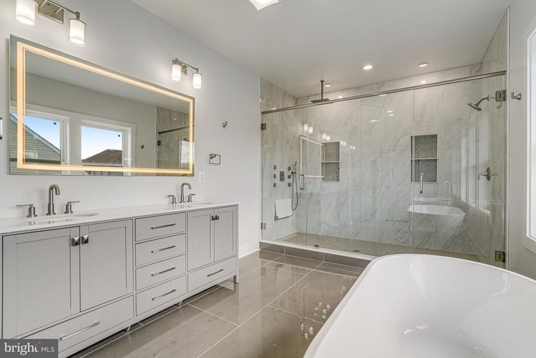 Bathroom, Dual Sink Vanities, Free Standing Baths, Glass Shower, Interior, Marble Walls, Recessed Lighting