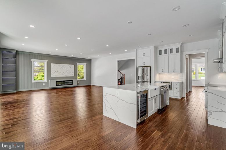 Interior, Kitchen, Marble Walls, Recessed Lighting, Stainless Steel Appliances, Wood Texture Flooring
