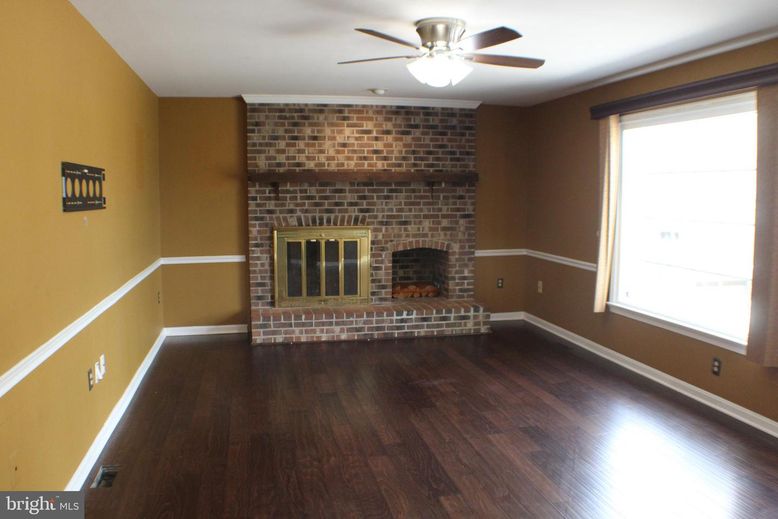 Empty room, Fireplace, Interior, Stone Walls, Wood Texture Flooring