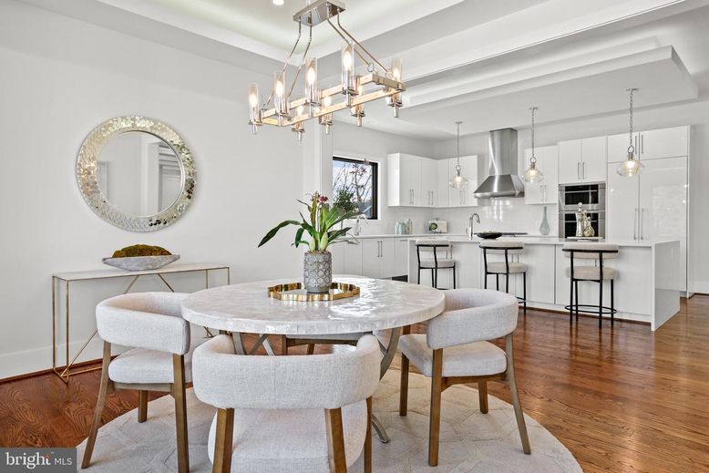 Chandelier, Dining room, Interior, Kitchen, Pendant Lights, Recessed Lighting, Stainless Steel Appliances, Wood Texture Flooring