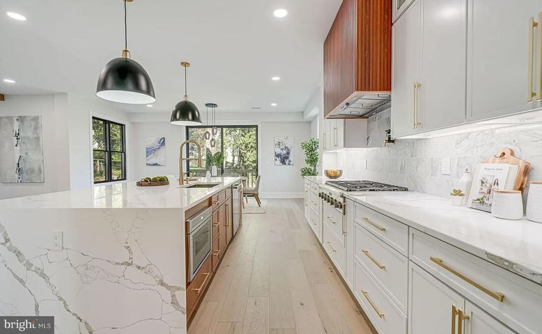 Interior, Kitchen, Marble Walls, Pendant Lights, Recessed Lighting, Wood Texture Flooring