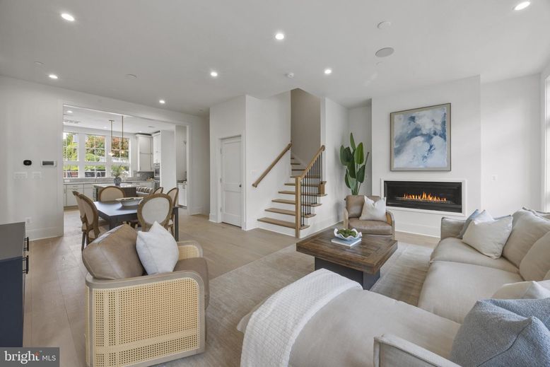 Dining room, Fireplace, Interior, Living room, Pendant Lights, Recessed Lighting, Wood Texture Flooring