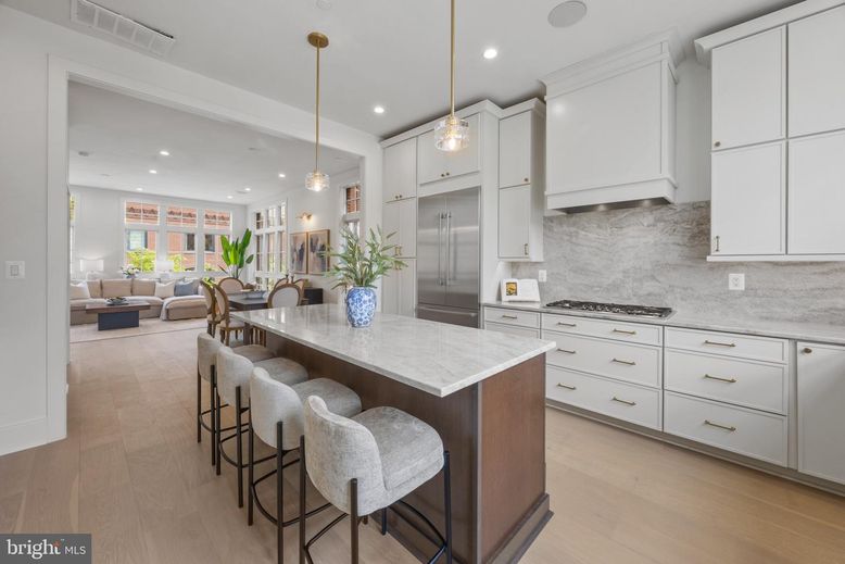Dining room, Interior, Kitchen, Living room, Pendant Lights, Recessed Lighting, Stainless Steel Appliances, Wood Texture Flooring