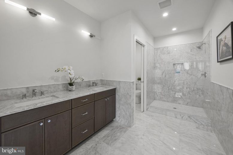 Bathroom, Dual Sink Vanities, Interior, Marble, Marble Walls, Recessed Lighting