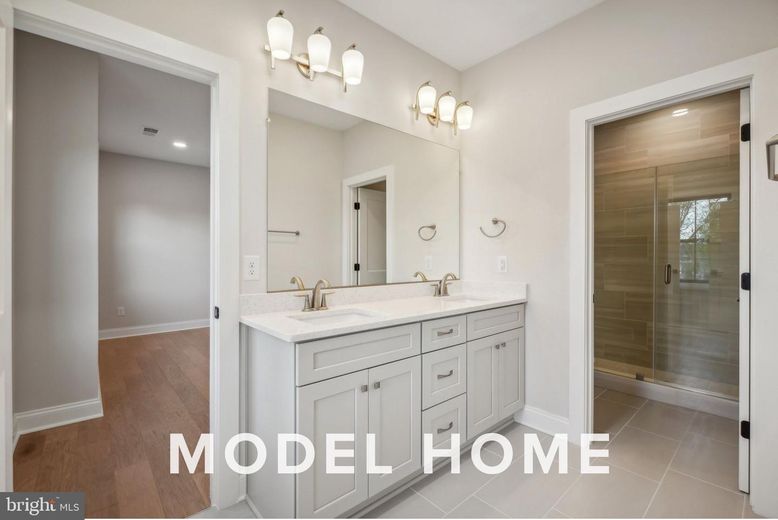 Bathroom, Dual Sink Vanities, Glass Shower, Interior, Recessed Lighting, Wood Texture Flooring
