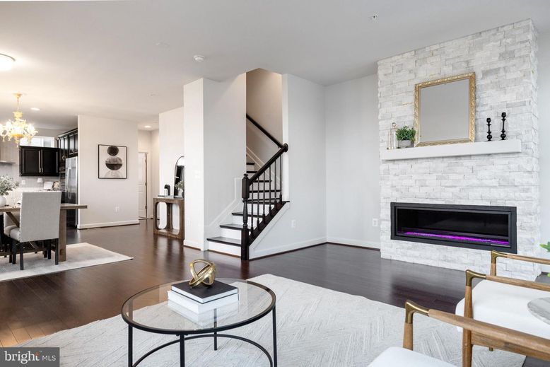 Chandelier, Dining room, Fireplace, Interior, Kitchen, Recessed Lighting, Stone Walls, Wood Texture Flooring