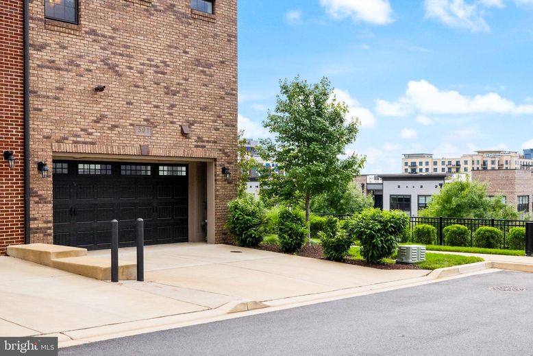 Attached, Exterior, Facade, Brick Facade, Condo Building