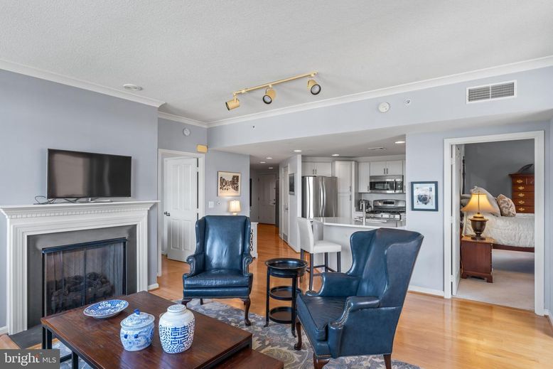 Fireplace, Interior, Kitchen, Living room, Recessed Lighting, Stainless Steel Appliances, Wood Texture Flooring