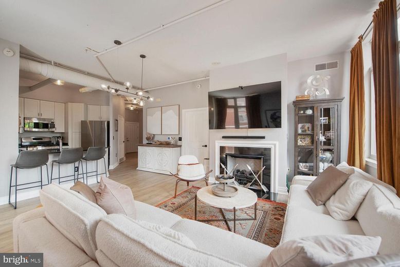 Fireplace, Interior, Kitchen, Living room, Pendant Lights, Stainless Steel Appliances, Wood Texture Flooring