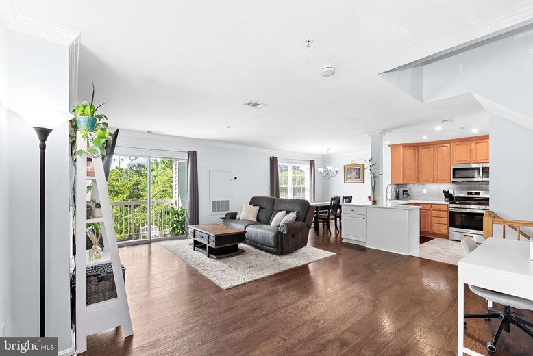 Chandelier, Dining room, Interior, Kitchen, Living room, Recessed Lighting, Stainless Steel Appliances, Wood Texture Flooring