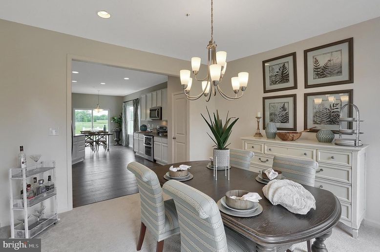 Chandelier, Dining room, Interior, Kitchen, Pendant Lights, Recessed Lighting, Stainless Steel Appliances, Wood Texture Flooring