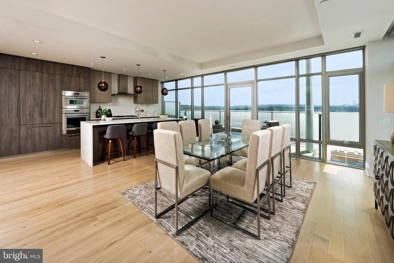 Dining room, Interior, Kitchen, Pendant Lights, Recessed Lighting, Stainless Steel Appliances, Water, Wood Texture Flooring