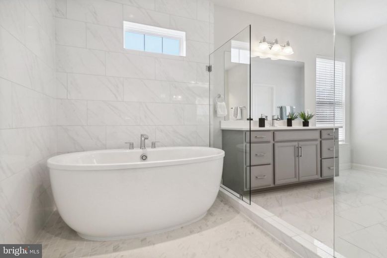 Bathroom, Dual Sink Vanities, Free Standing Baths, Glass Shower, Interior, Marble, Marble Walls