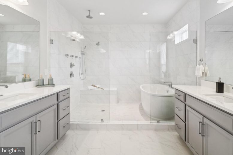 Bathroom, Dual Sink Vanities, Free Standing Baths, Glass Shower, Interior, Marble, Marble Walls, Recessed Lighting