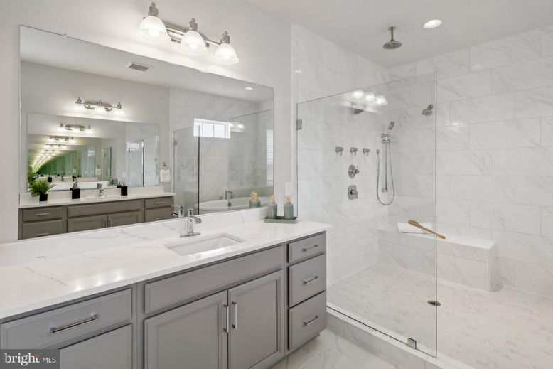 Bathroom, Dual Sink Vanities, Glass Shower, Interior, Marble, Marble Walls, Recessed Lighting