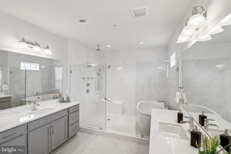 Bathroom, Dual Sink Vanities, Free Standing Baths, Glass Shower, Interior, Marble, Marble Walls, Recessed Lighting