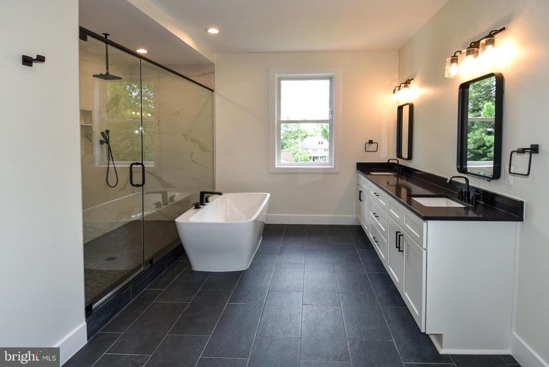 Bathroom, Dual Sink Vanities, Free Standing Baths, Glass Shower, Interior, Marble Walls, Recessed Lighting