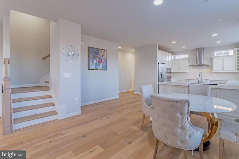 Dining room, Interior, Kitchen, Recessed Lighting, Stainless Steel Appliances, Wood Texture Flooring