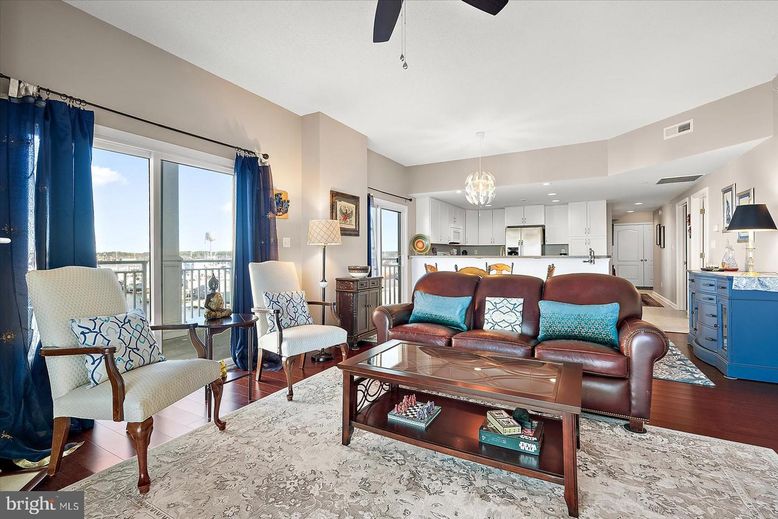 Chandelier, Interior, Kitchen, Living room, Recessed Lighting, Stainless Steel Appliances, Wood Texture Flooring